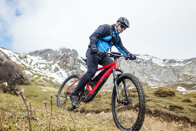 Cyclist man riding mountain bike