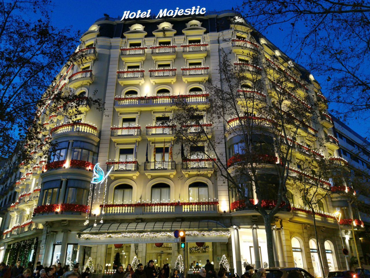 LOW ANGLE VIEW OF ILLUMINATED BUILDING