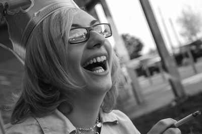 Young woman in sunglasses