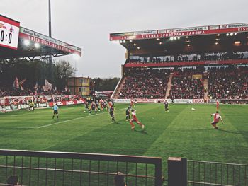 Group of people in stadium