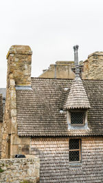 Low angle view of old building against sky