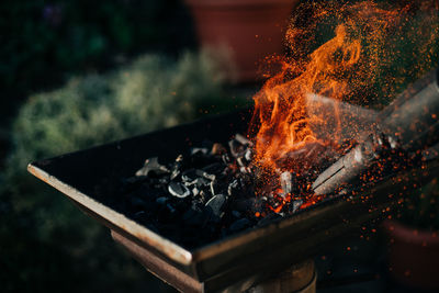 Close-up of fire on barbecue grill