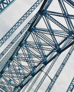 Low angle view of metallic structure against sky