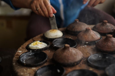 Close-up of person preparing food