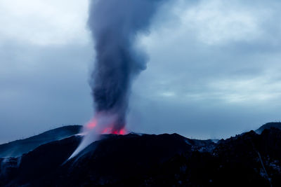 Panoramic view of volcanic mountain against sky