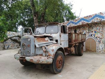Abandoned vintage car in park