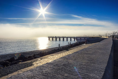 Scenic view of sea against sky at sunset