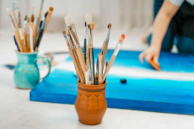 Tools and equipment for artist. palette and brushes close-up.  process of drawing and creativity.