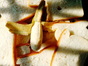 High angle view of bread on cutting board