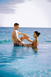 Couple enjoying in sea