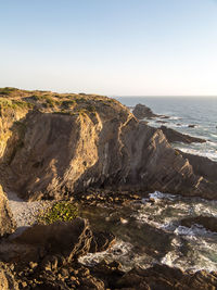 Scenic view of sea against clear sky