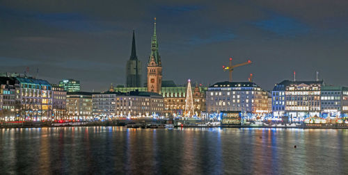 Illuminated buildings in city at night