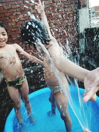 People enjoying in swimming pool