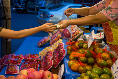 Various fruits for sale at market stall