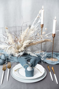 Close-up of candles on table
