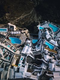 High angle view of cranes against mountain