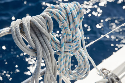 Close-up of rope tied on metal