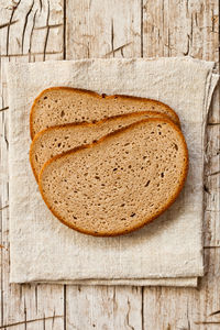 High angle view of bread on cutting board