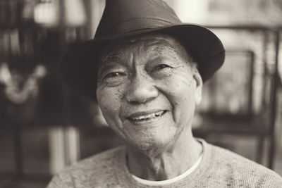 Portrait of smiling man wearing hat