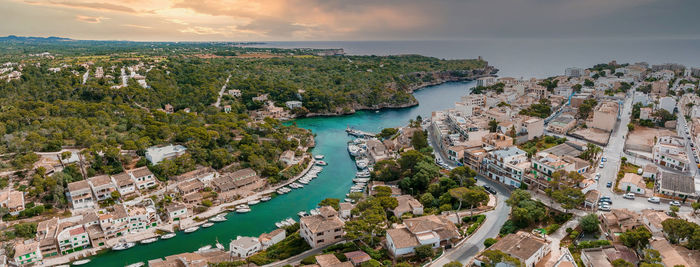 Aerial view of the porto colom fishing village in majorca.