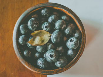 High angle view of fruits in bowl on table