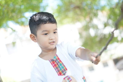 Portrait of cute boy looking at camera