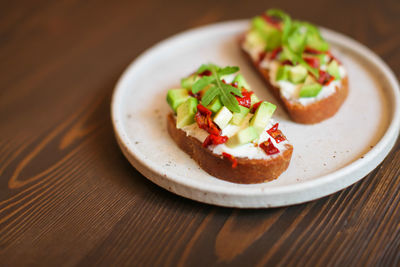 High angle view of salad in plate on table