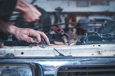 Man working in car