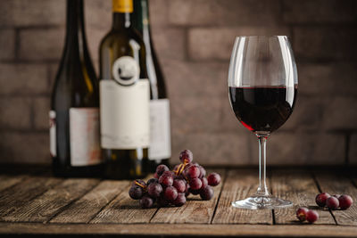 Close-up of wineglass on table