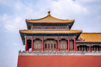 Low angle view of temple building against sky