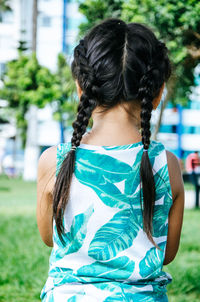 Rear view of woman with umbrella