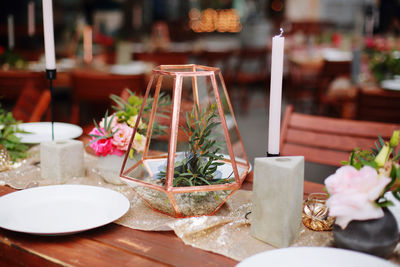 Festive wedding decor on the table. floral arrangements of succulents and roses
