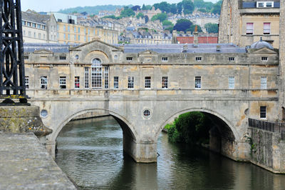 Photo of an ancient stone bridge in bath, england