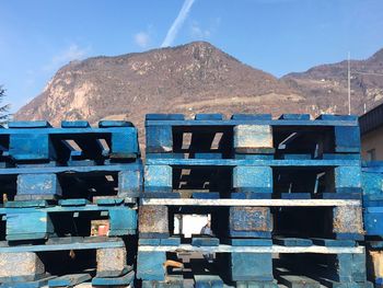 Stack of houses against mountain range