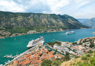 High angle view of boats moored at harbor