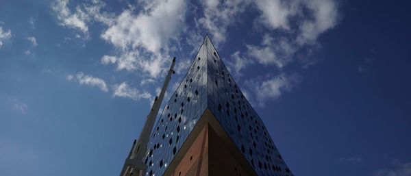 Low angle view of modern buildings against sky