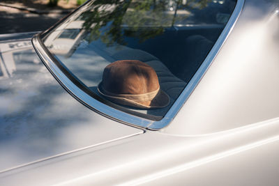 Reflection of car on side-view mirror