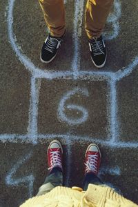 Low section of person standing on ground