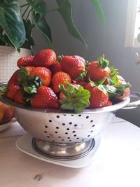 Close-up of strawberries in bowl on table