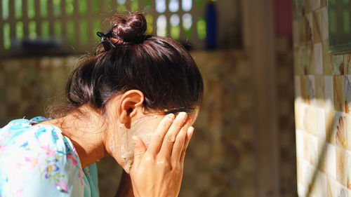 Side view of woman looking away