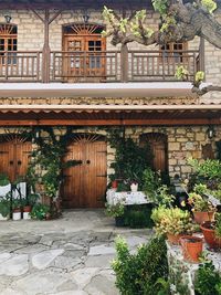 Potted plants at entrance of building