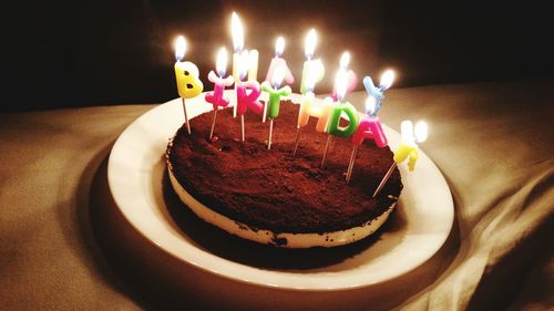 Close-up of candles on table