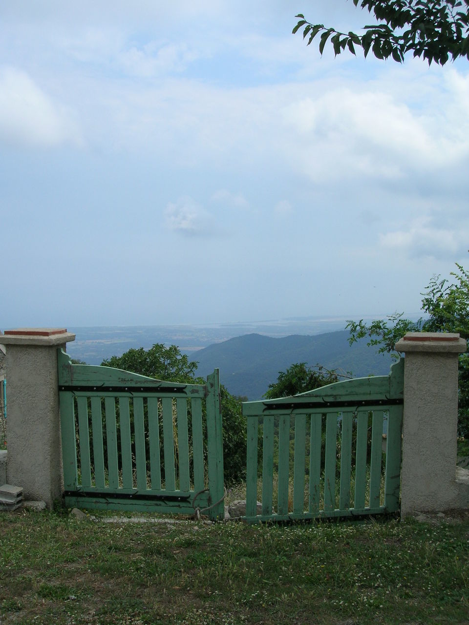 BUILT STRUCTURE ON FIELD AGAINST SKY