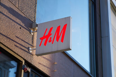 Low angle view of sign against building