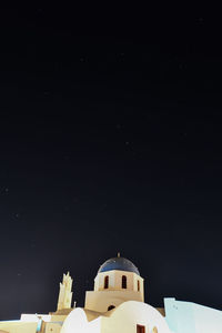 Low angle view of building against sky at night
