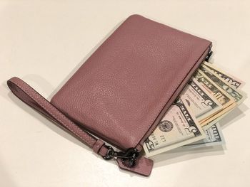 High angle view of clock over white background