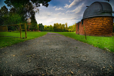 Road passing through field