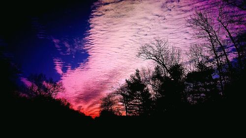 Scenic view of river at sunset