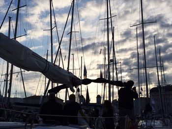 Boats moored at harbor