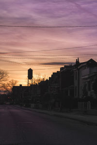 Road against sky at sunset